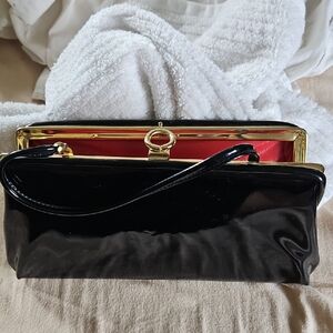 Elegant Black and Red Clutch Bag
